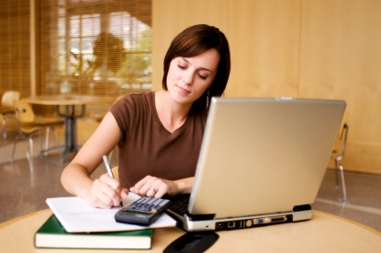 Woman working on computer.